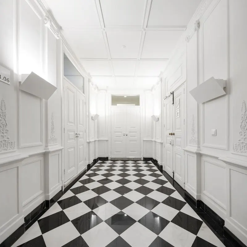 República 23 — chequered marble corridor, restored interior
